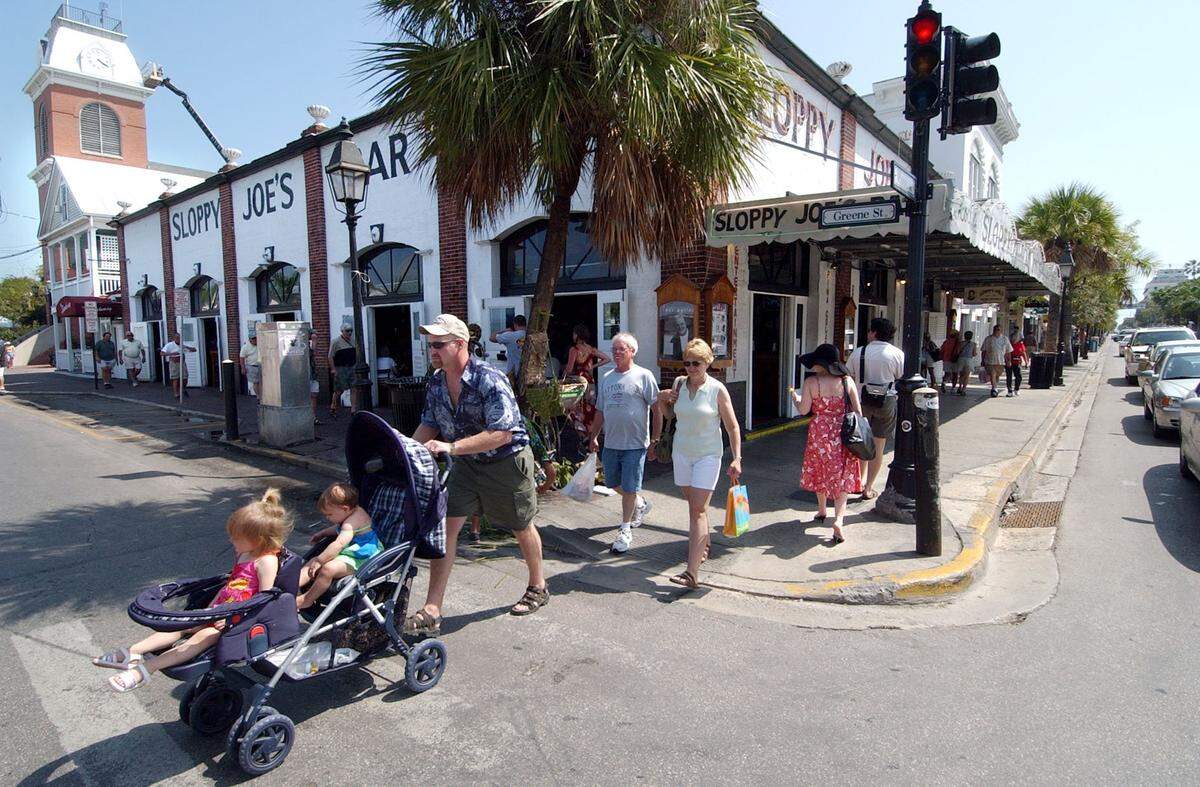 In 2004, tourists clog Duval Street as they pass Sloppy Joe’s bar on Duval Street.