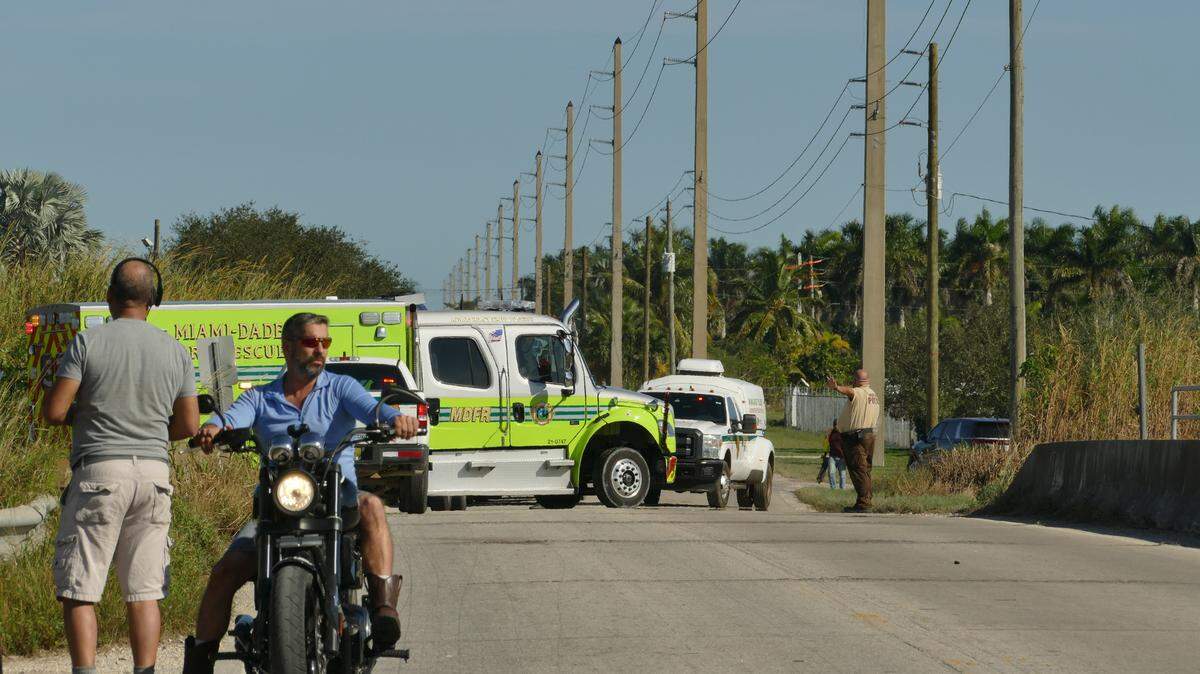 A Miami-Dade Fire Rescue vehicle exits the area of a helicopter crash on Wednesday, Dec. 27, 2023.