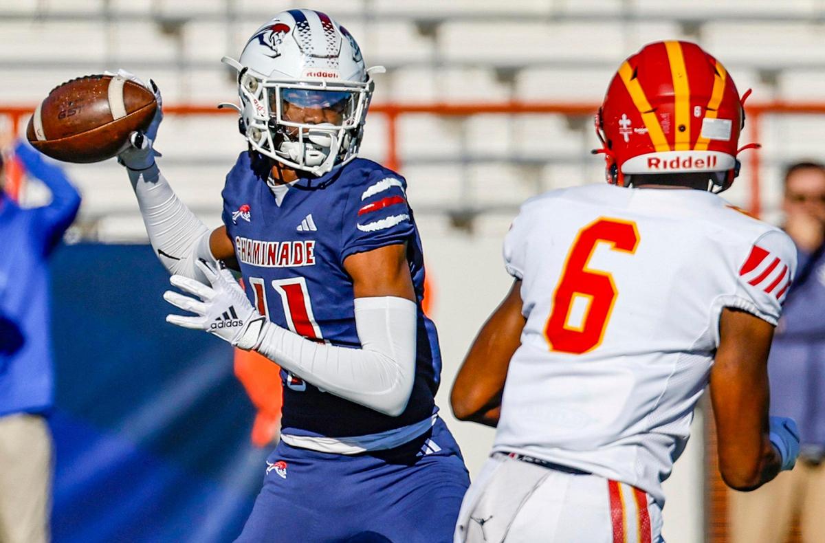 Chaminade-Madonna Lions quarterback Cedrick Bailey (11) sets up to pass against the Clearwater Central Catholic Marauders in the first quarter during the Class 1M, Region 3, District 6, State Championship game at Bragg Memorial Stadium in Tallahassee, Florida, on Thursday, December 7, 2023.