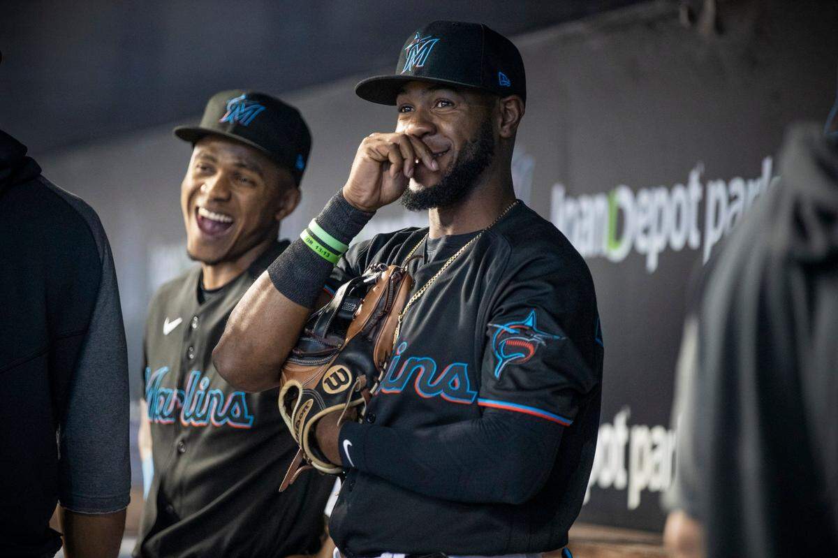 Miami Marlins outfielder Bryan De La Cruz, reacts from the dugout before the start of the baseball game against the New York Yankees at loanDepotpark in Miami on Friday, July 30, 2021.