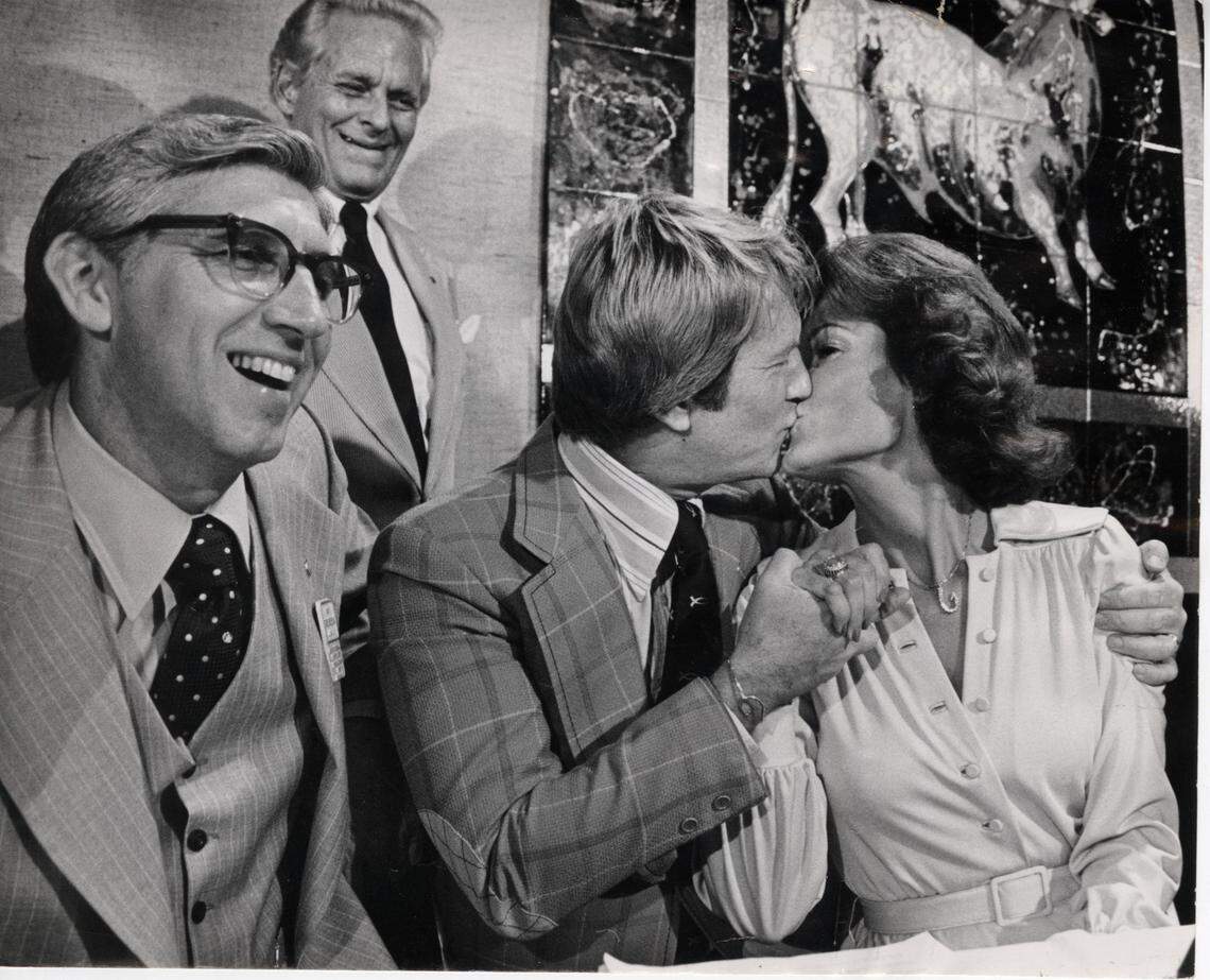 Anita Bryant kisses her husband, Bob Green, on June 7, 1977, the day voters repealed the county’s gay-rights ordinance.
