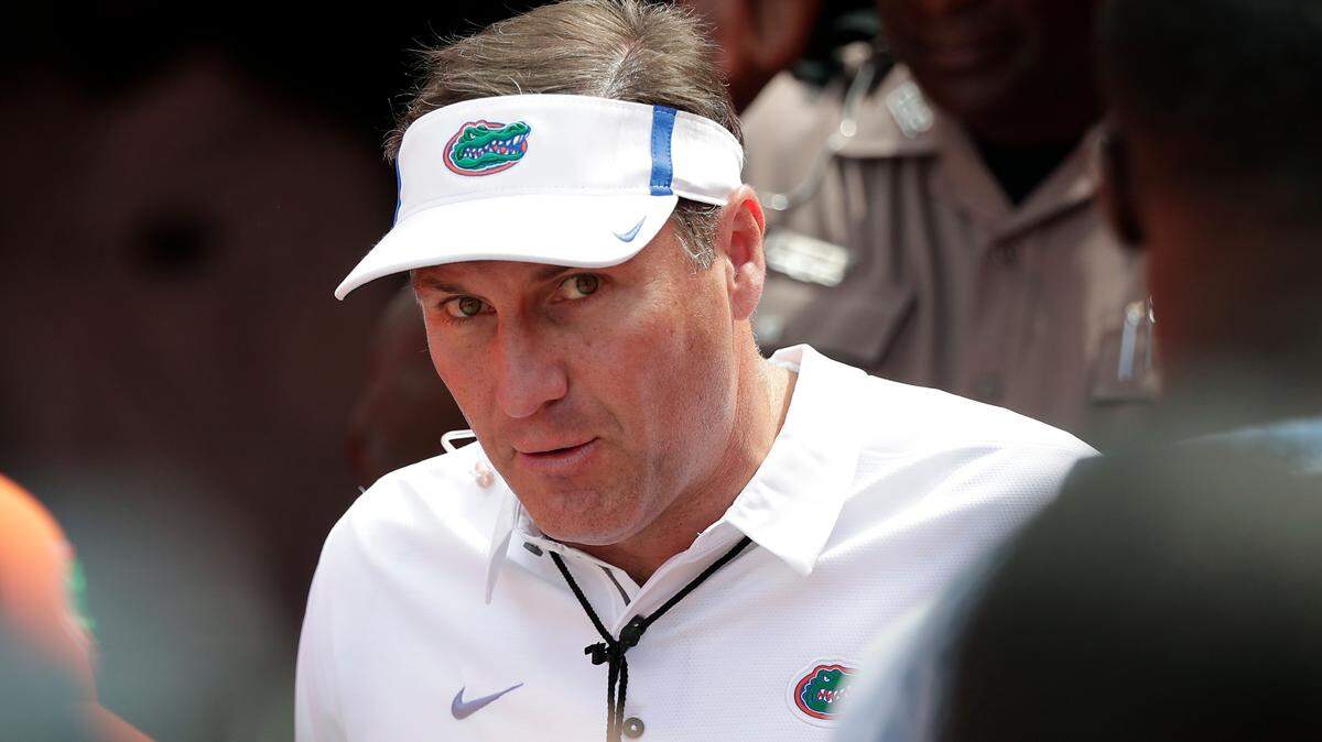 Florida head coach Dan Mullen takes the field before an NCAA spring college football intrasquad game April 14 in Gainesville.