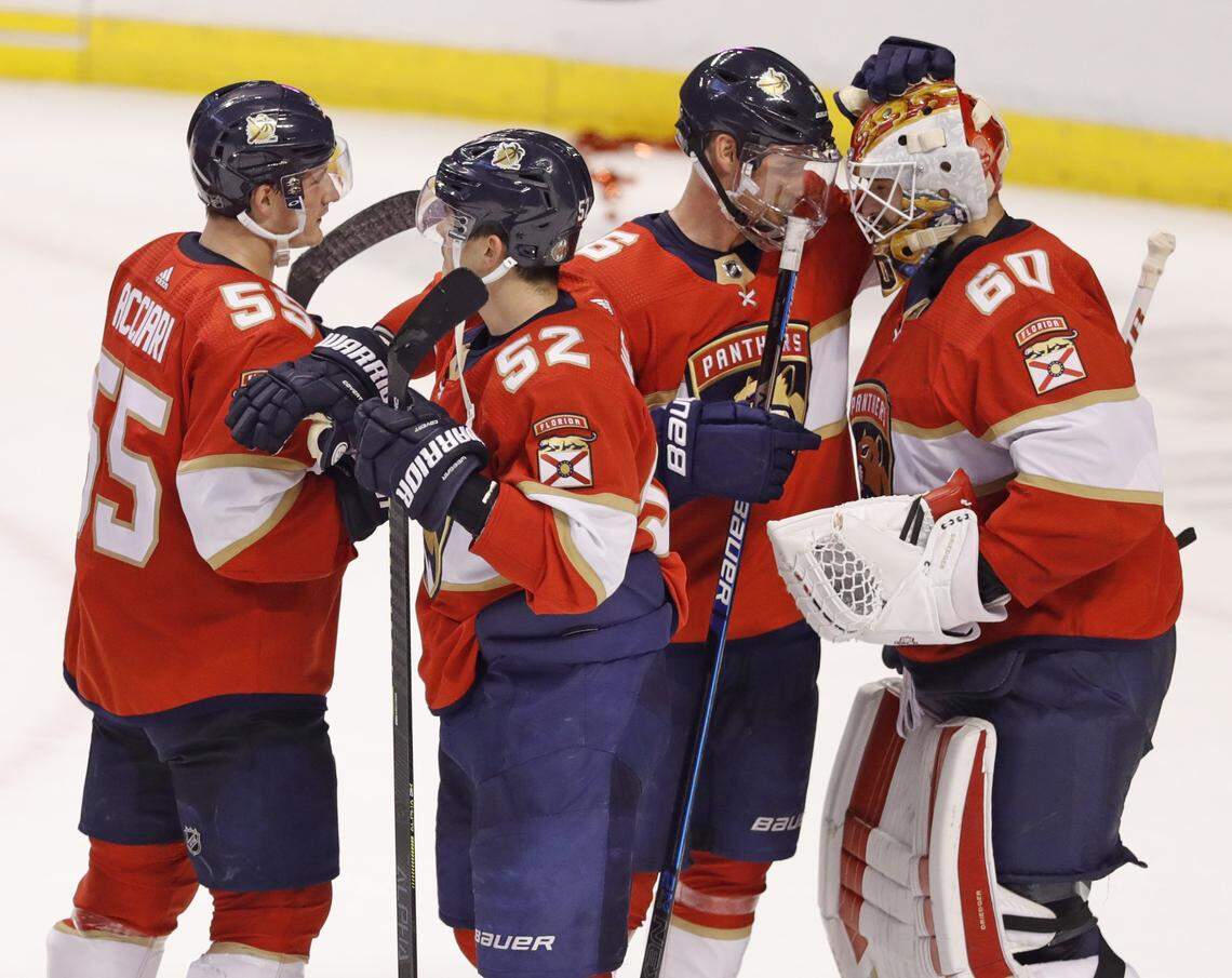 Florida Panthers center Noel Acciari (55), defenseman MacKenzie Weegar (52), defenseman Anton Stralman (6) and goaltender Chris Driedger (60) celebrate after defeating the as the Montreal Canadiens 4-1 at the BB&T Center in Sunrise on Saturday, March 7, 2020.