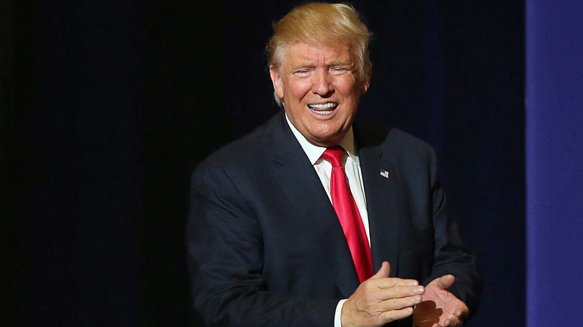 Donald J. Trump, Republican presidential candidate, reacts after speaking during a rally on Thursday, Oct. 13, 2016 at the South Florida Fair & Expo Center in West Palm Beach, Florida.