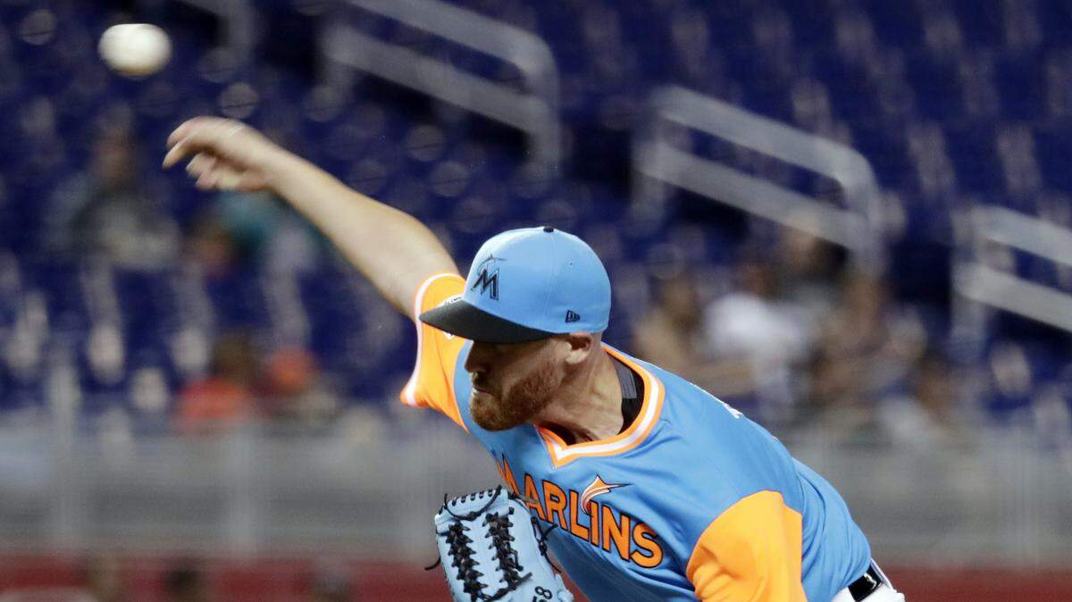 Miami Marlins starting pitcher Dan Straily delivers during the first inning of a baseball game against the Miami Marlins, Friday, Aug. 24, 2018, in Miami. (AP Photo/Lynne Sladky)