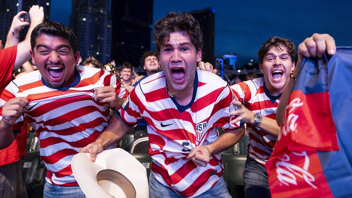 From left to right: Damian Rodriguez, Caleb Triana and Caleb Rojas cheer after the United States scored during a watch party at the FIFA Fan Festival 2026 in Bayfront Park on Wednesday, July 1, 2026, in downtown Miami, Fla. The United States defeated Bosnia and Herzegovina 2 to 0 in their FIFA World Cup Round of 32 soccer match in Santa Clara, Calif.