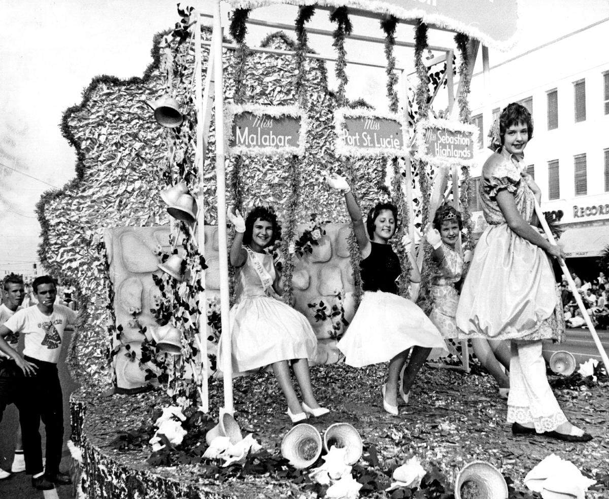 A float representing communities along Florida’s Treasure Coast cruises past the judge’s stand in the Jr. Orange Bowl Parade in Coral Gables in 1961.