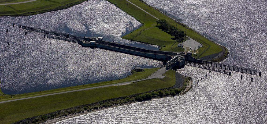 A lock and dam on Lake Okeechobee feeds the C-44 reservoir, an Everglades restoration project designed to spare the delicate estuary to the east of the lake of harmful nutrient pollution and toxic algae.