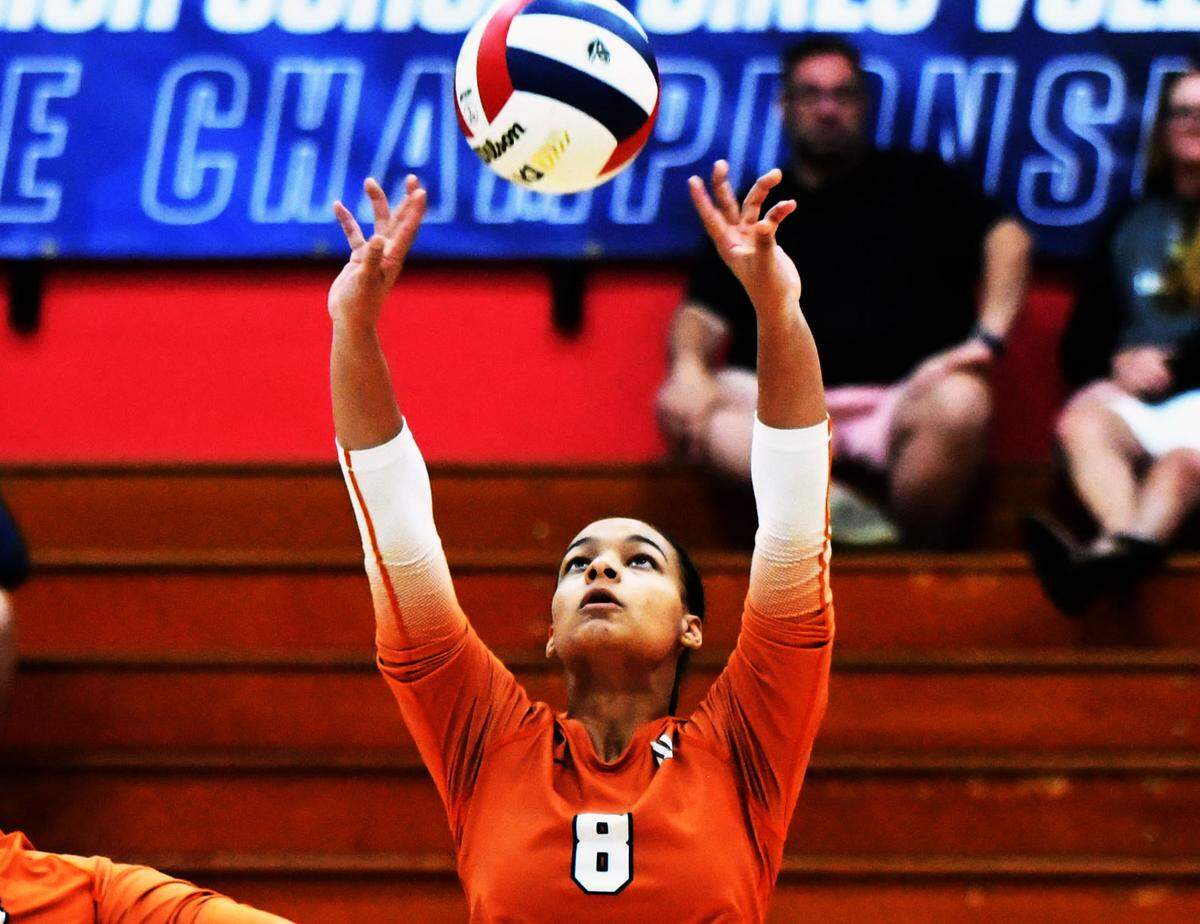 Mater Lakes senior Sydney Wilson sets up a shot against Orlando Bishop Moore during the Class 4A girls volleyball state championship game on Saturday at Polk State College in Winter Haven.