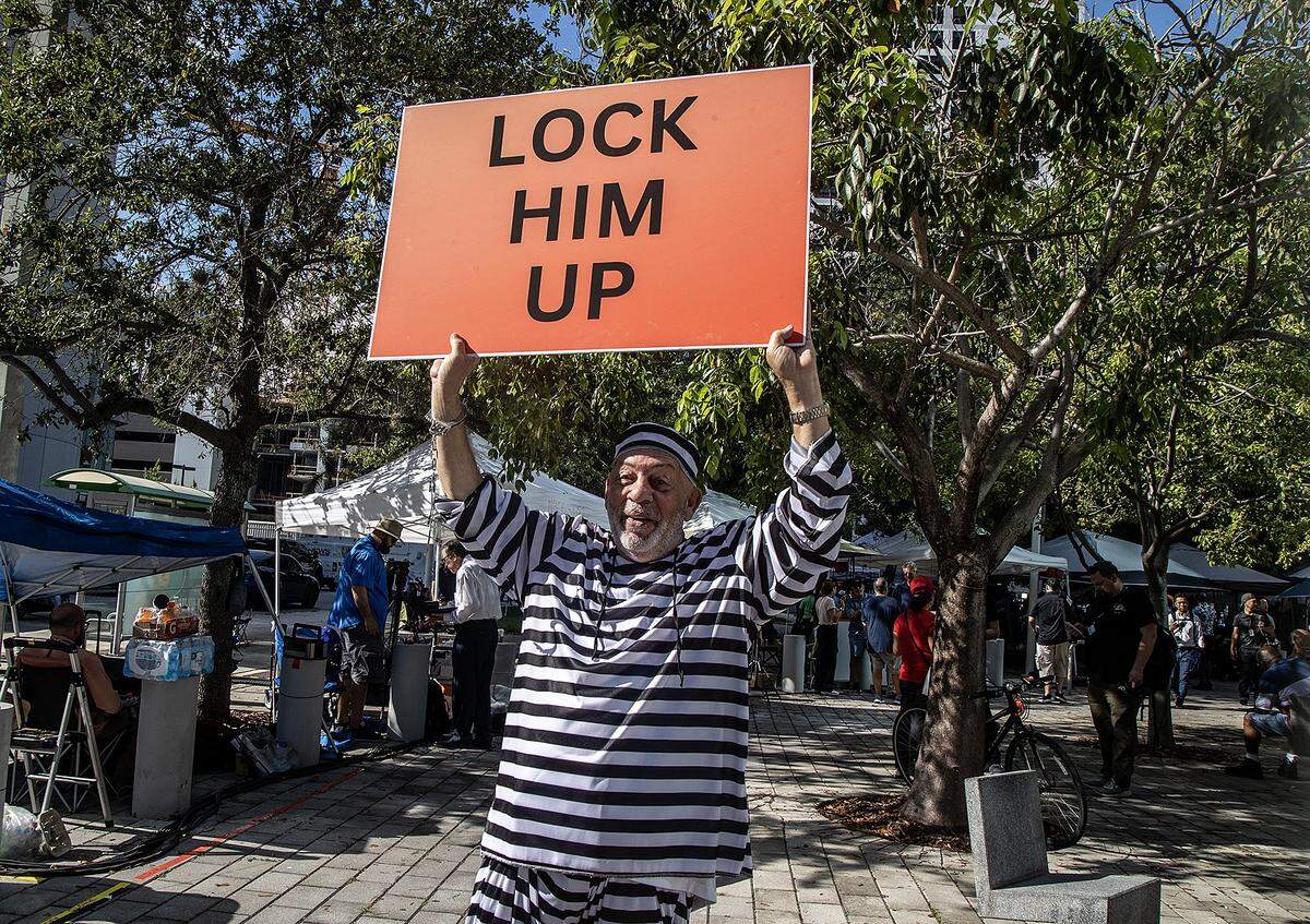 Cuban exile Domenic Santana, who supports the indictment of former President Donald Trump stands in front of the Miami Federal Courthouse ahead of Trump’s court appearance, on Tuesday, June 13, 2023.