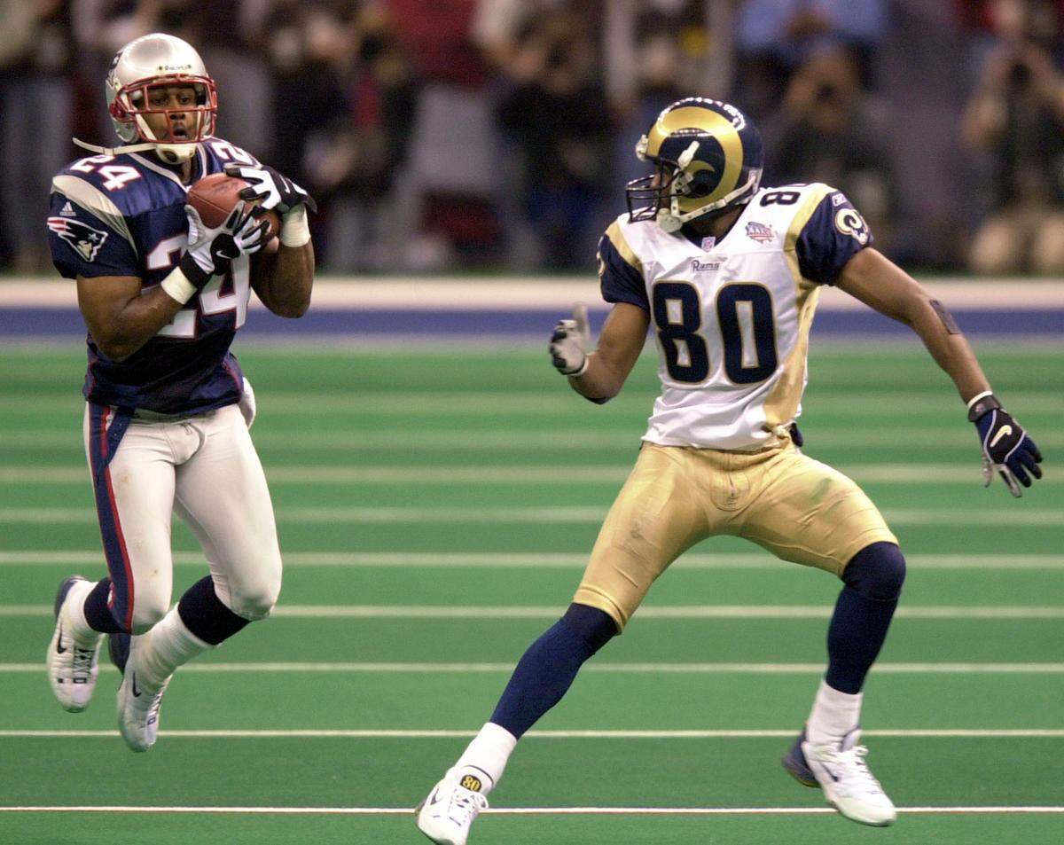 You could argue this was the play that interrupted one dynasty and began the rise to power of another -- Patriots cornerback Ty Law intercepts a pass intended for Rams wide receiver Isaac Bruce and returns it for the first touchdown of New England’s Super Bowl XXXVI upset