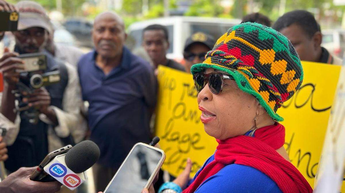 Liliane Pierre-Paul, an award-winning Haitian journalist and radio station owner, being interviewed at a July 16, 2023 protest demanding the release of kidnapped journalist Pierre-Louis Opont.
