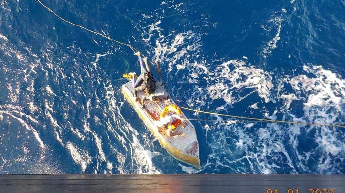 A civilian rescued and reported to the U.S. Coast Guard a vessel approximately 25 miles west of Boot Key on Jan. 1, 2021. The Coast Guard Cutter Margaret Norvell and Raymond Evans’ crew repatriated 119 people to Cuba on Jan. 3 following 12 interdictions.