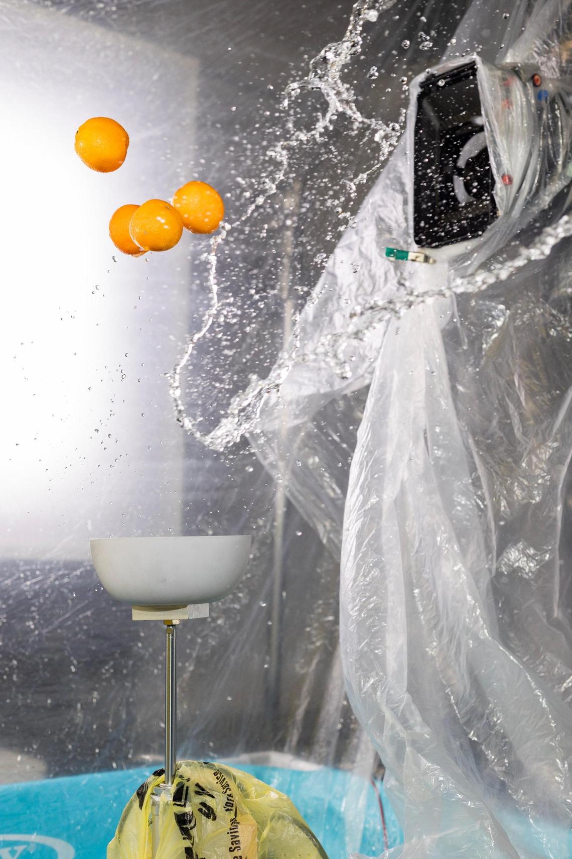 Aguila used a launcher to throw the oranges into the air and a catapult to toss the water at the airborne oranges. It took several takes to get the moment captured just right. “We start with the movement of the robot that is going to be always constant, and then we’re going to start [adjusting] the other variables in the shot,” Aguila said.