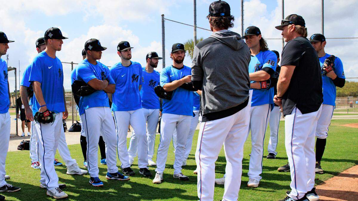 Miami Marlins manager Don Mattingly and pitching coach Mel Stottlemyre Jr talk with pitchers and catchers during their spring training workout at Roger Dean Stadium on Wednesday, March 16, 2022 in Jupiter, FL.