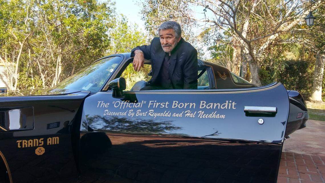 Burt Reynolds with the 1976 Trans Am that inspired the use of a 1977 Trans Am in the movie “Smokey and the Bandit.”