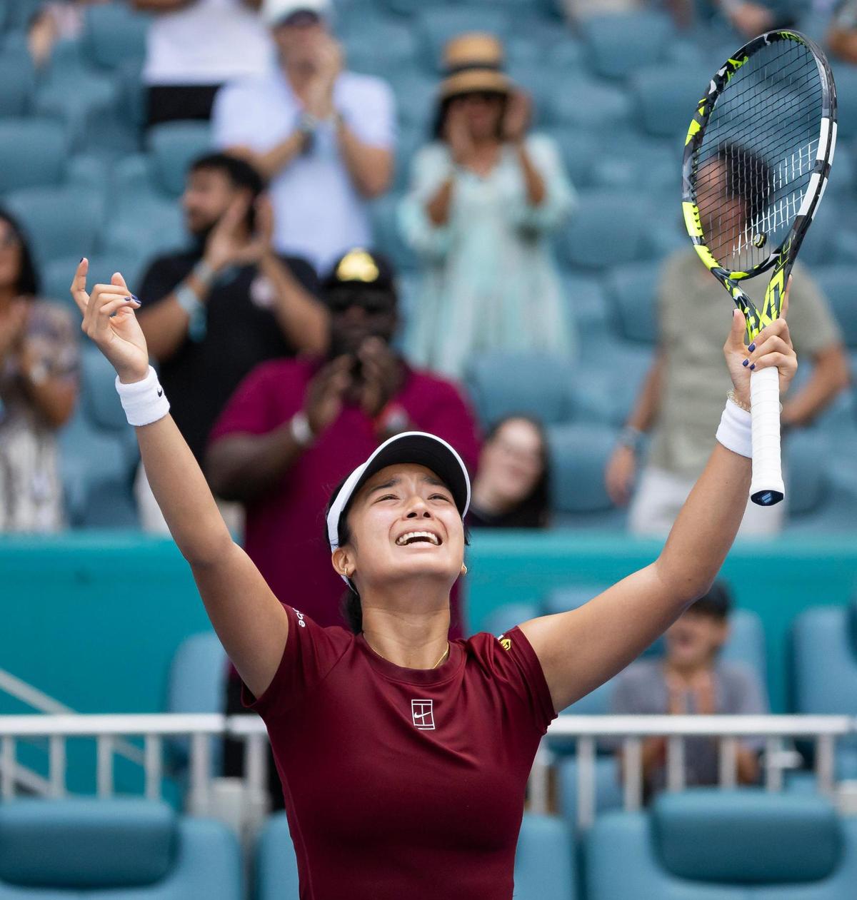 Alexandra Eala, of the Philippines, reacts after she defeated Iga Swiatek, of Poland, during their women’s quarter-final match at the Miami Open tennis tournament, held at Hard Rock Stadium on Wednesday, March 26, 2024, in Miami Gardens, Florida.