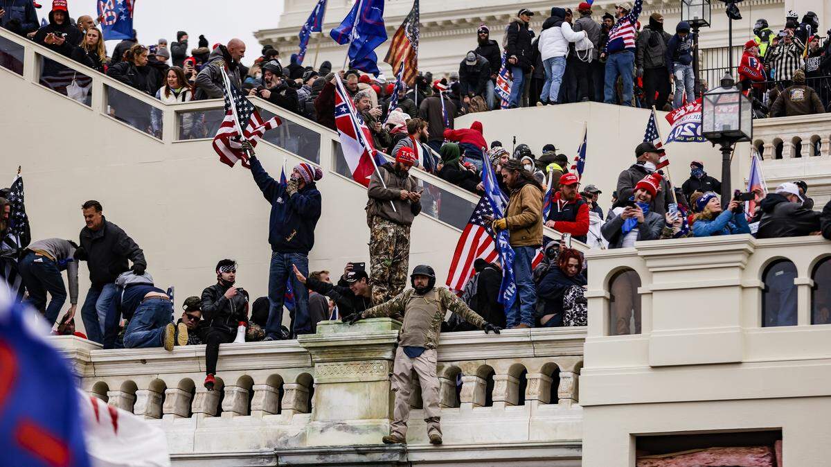 A pro-Donald Trump mob storms the U.S. Capitol following a rally with President Trump on Wednesday, Jan. 6, 2021, in Washington, D.C. 
