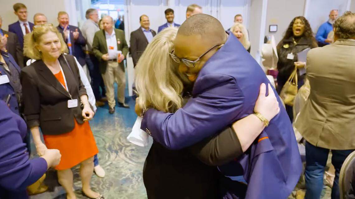 Jovante Teague, the newly elected vice chairman of the Republican Party of Florida embraces congresswoman Kat Cammack during the annual RPOF meeting in Orlando, Fla., in January 11, 2025.