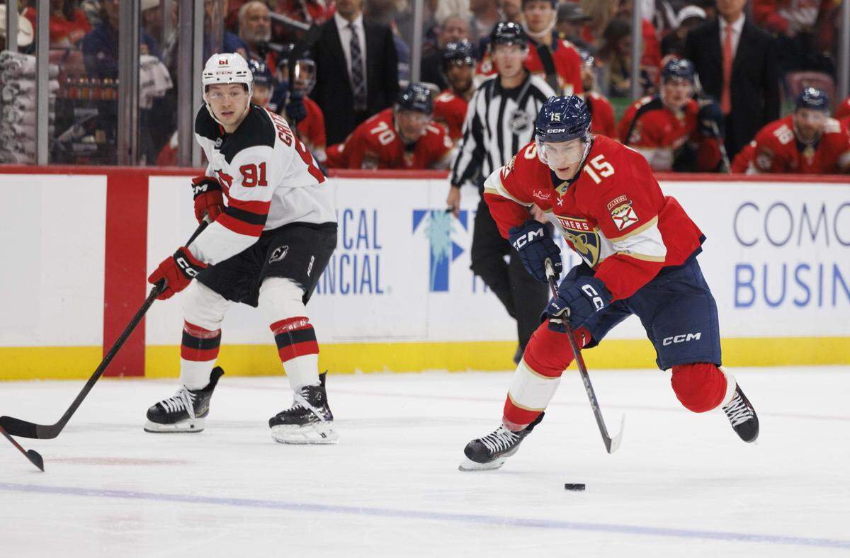 Florida Panthers center Anton Lundell (15) takes the puck down the ice during the third period of a game against the New Jersey Devils on Thursday, Nov. 20, 2025, at Amerant Bank Arena in Sunrise, Fla. The Florida Panthers won 1-0.