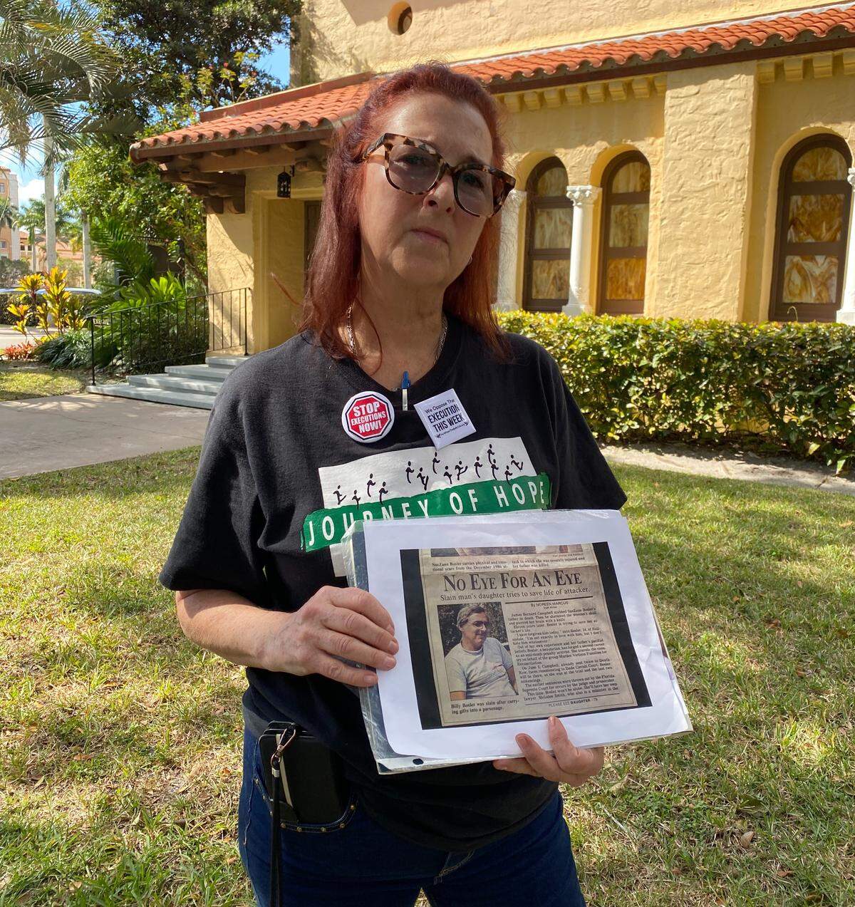 SueZann Bosler holds a newspaper clipping of a story about her advocacy to save the man who murdered her father from receiving the death penalty. Bosler co-founded Journey of Hope From Violence to Healing, an organization led by murder victim family members who oppose the death penalty.