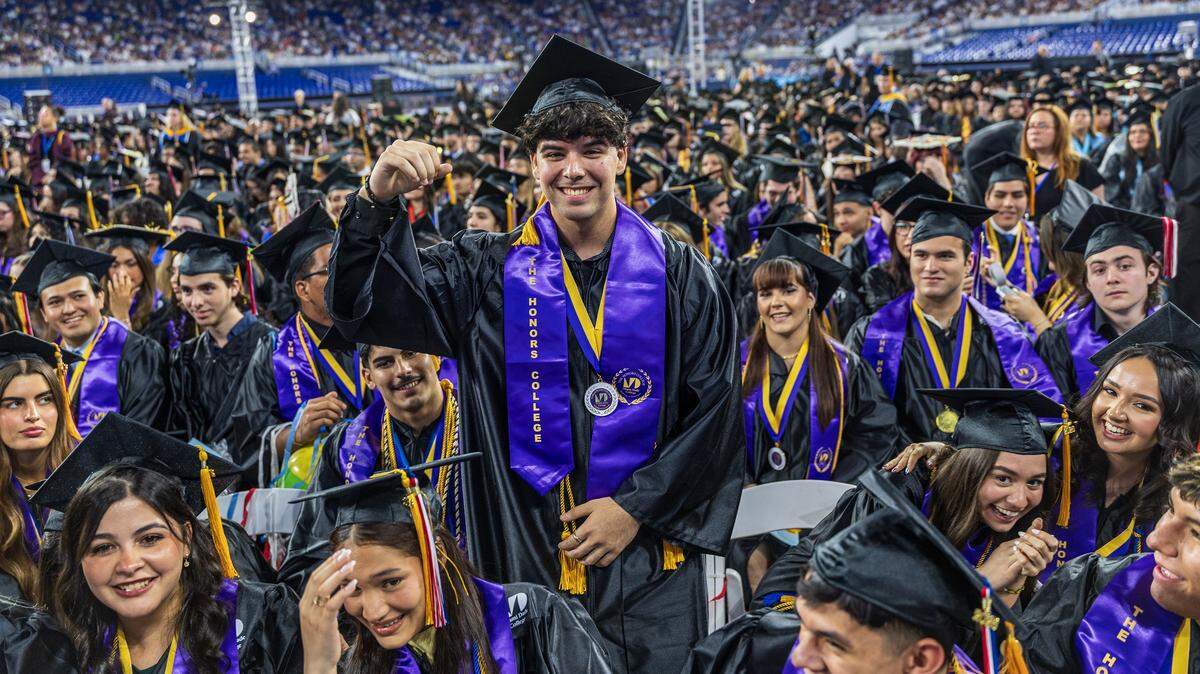 David Alejandro Ramírez Núñez celebrates during a Miami Dade College graduation ceremony at loanDepot park in Miami on Saturday, April 25, 2026. He earned a degree in mechanical engineering. 