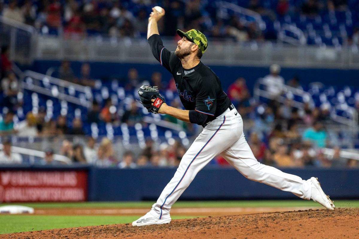 Miami Marlins pitcher Dylan Floro (36) throws the ball during the eighth inning of an MLB game against the Atlanta Braves at loanDepot park in the Little Havana neighborhood of Miami, Florida, on Friday, May 20, 2022.