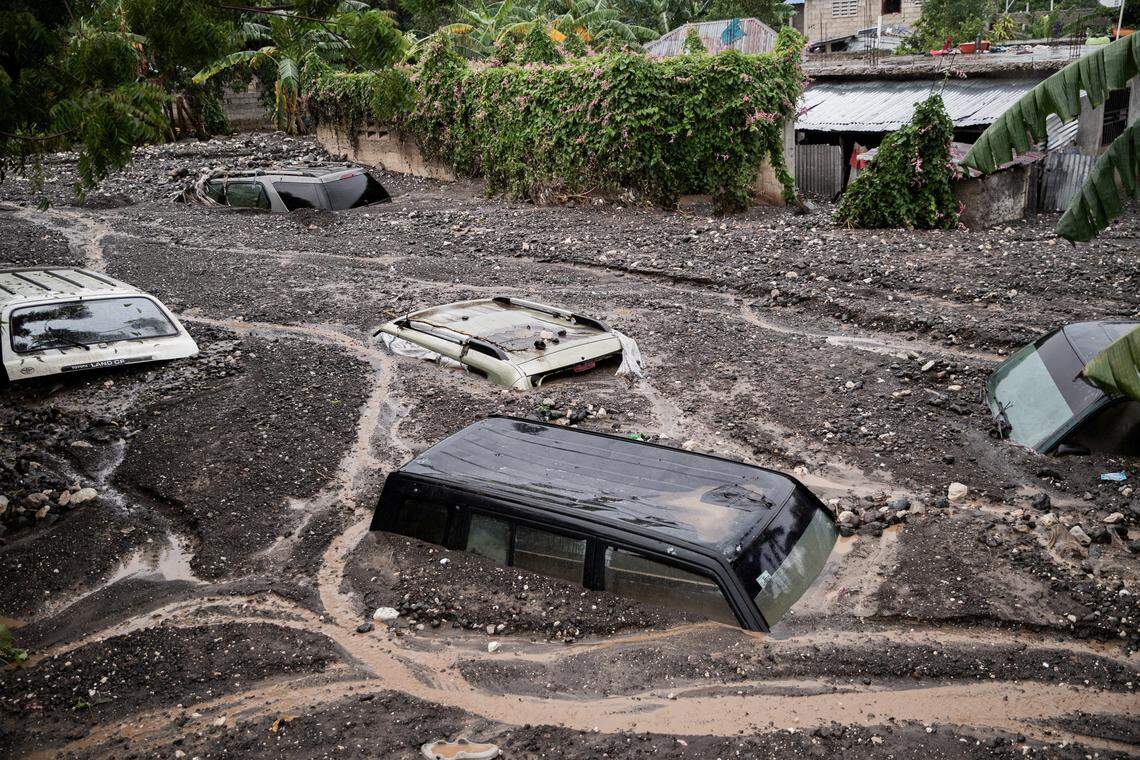 Cars are submerged in mud following Hurricane Melissa in Petit-Goave, 68km southwest of Port-au-Prince, on October 30, 2025. 
