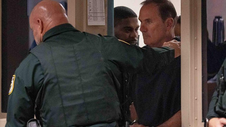 Mike Caruso has assault rifles, too dangerous for release, prosecutors say