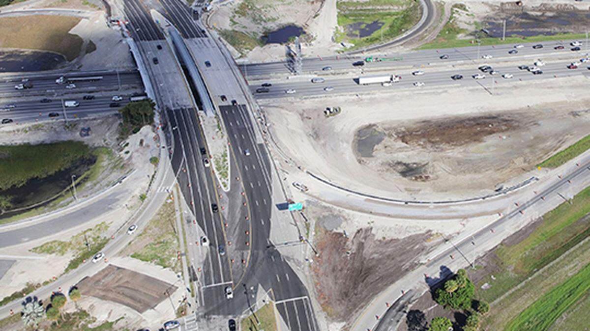 An aerial view of the diverging diamond interchange at Glades Road and I-95.
