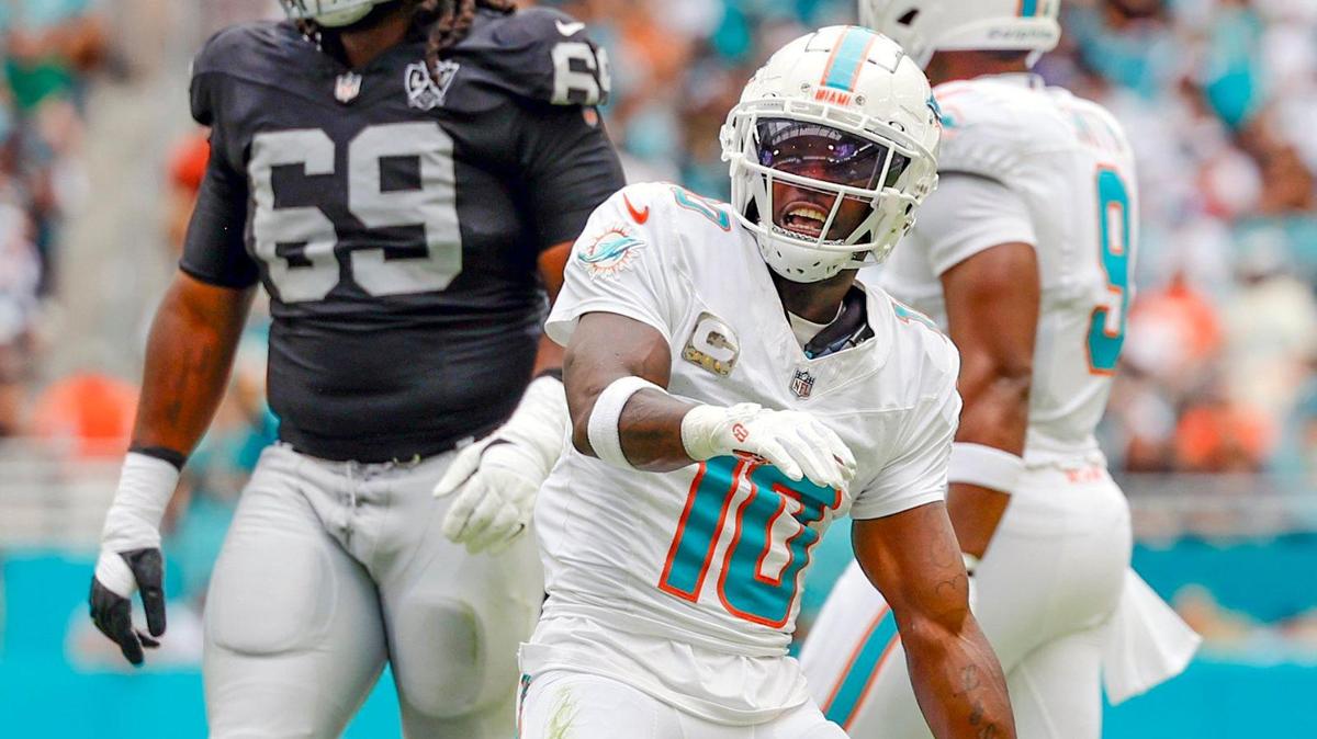 Miami Dolphins wide receiver Tyreek Hill (10) reacts after a first down against the Las Vegas Raiders in the first half of their NFL game in Miami Gardens, Florida on Sunday, November 17, 2024.