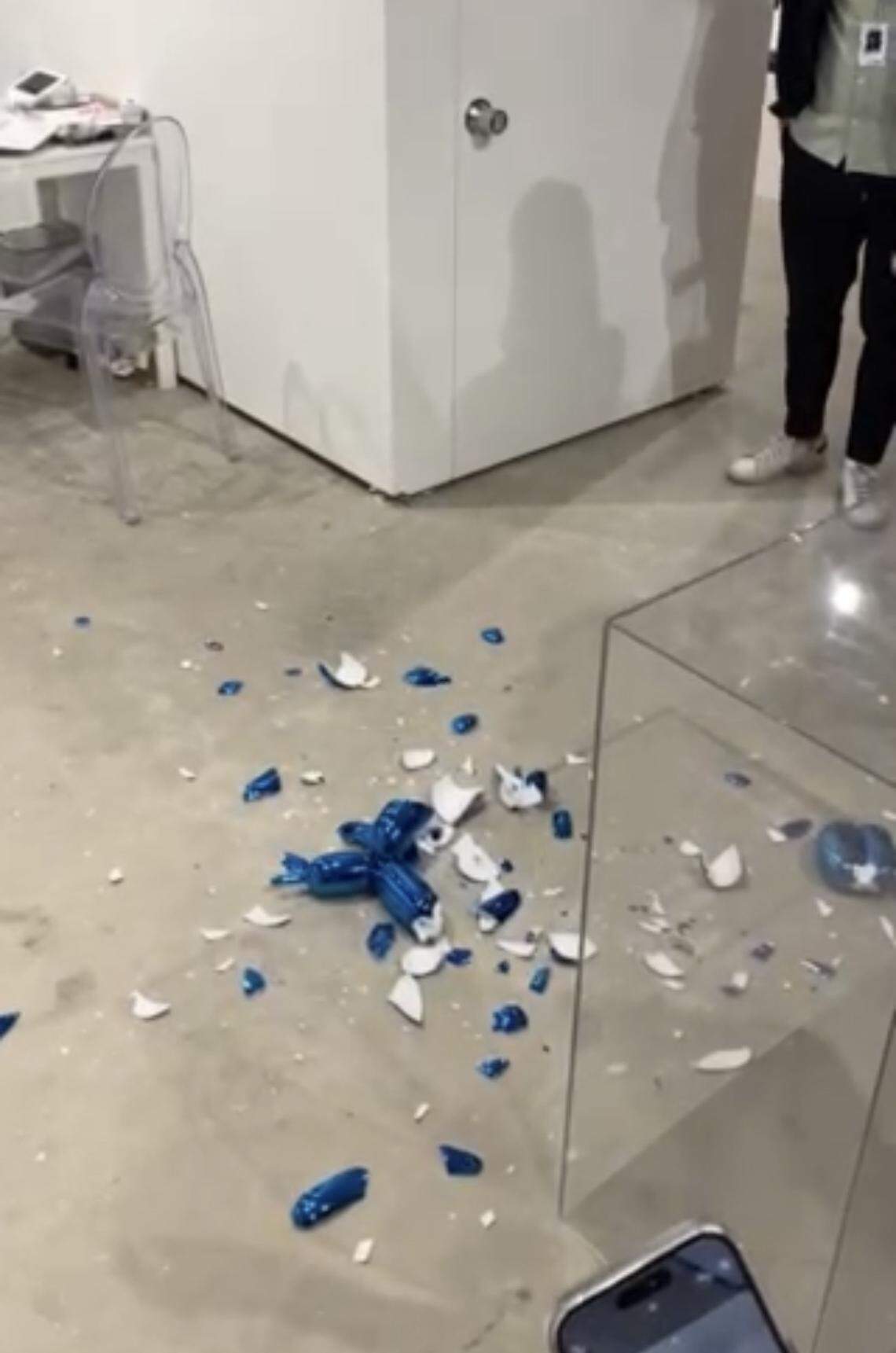 The scene at the Bel-Air Fine Art booth just after a patron of Art Wynwood accidentally destroyed a Jeff Koons sculpture.