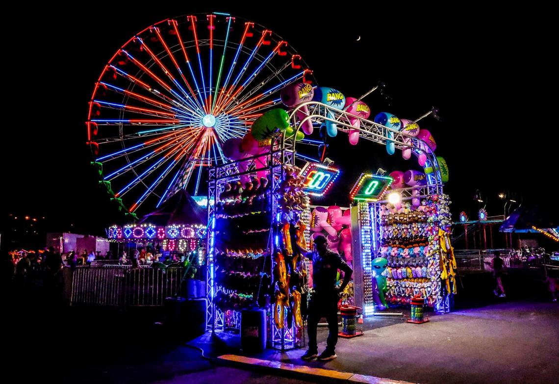 Christmas Wonderland’s Magnificent Midway light’s up during opening night at Tropical Park in Miami on Friday, November 17, 2023.