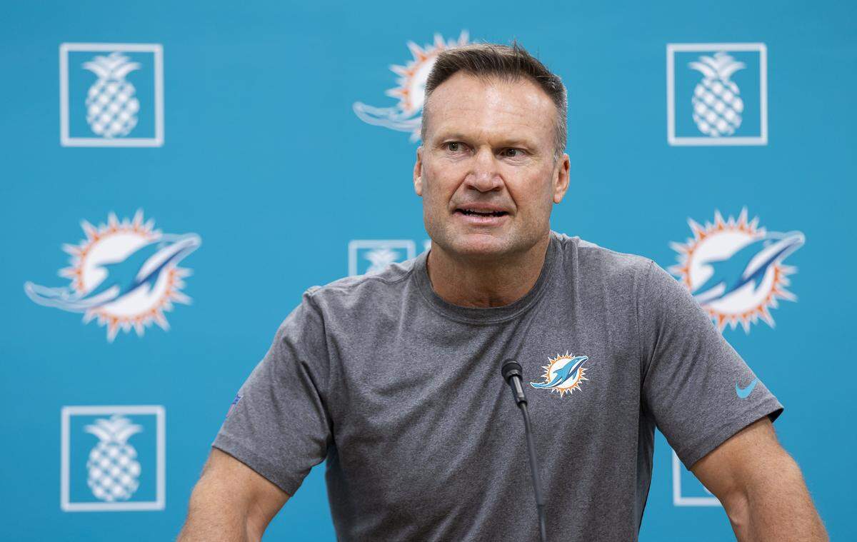 Former Miami Dolphins linebacker Zach Thomas introduces former Dolphins defensive tackle Tim Bowens during a press conference at the Baptist Health Training Complex on Monday, Aug. 5, 2024, in Miami Gardens, Fla. The Miami Dolphins announced they would add Bowens to their ring of honor at the Hard Rock Stadium.