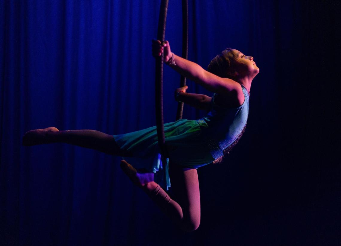 Isabella Bellamy, 7, practices her lyra routine for the camp recital at the Miami Circus Arts Center on July 7, 2023, in Miami, Fla. The summer campers each had their own routine that they performed for the parents.