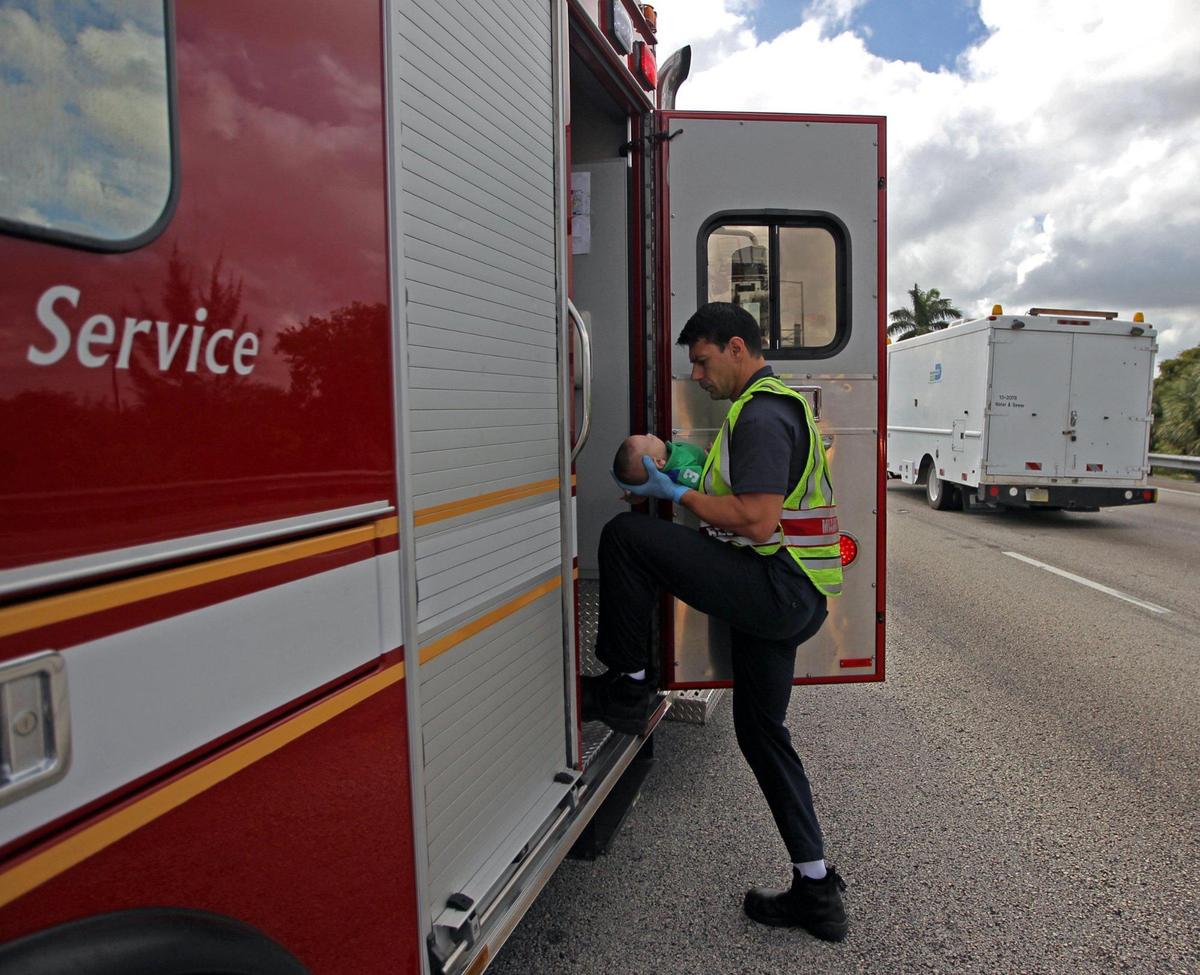 A Miami Fire Rescue paramedic transports to the hospital Sebastian de la Cruz in 2014.