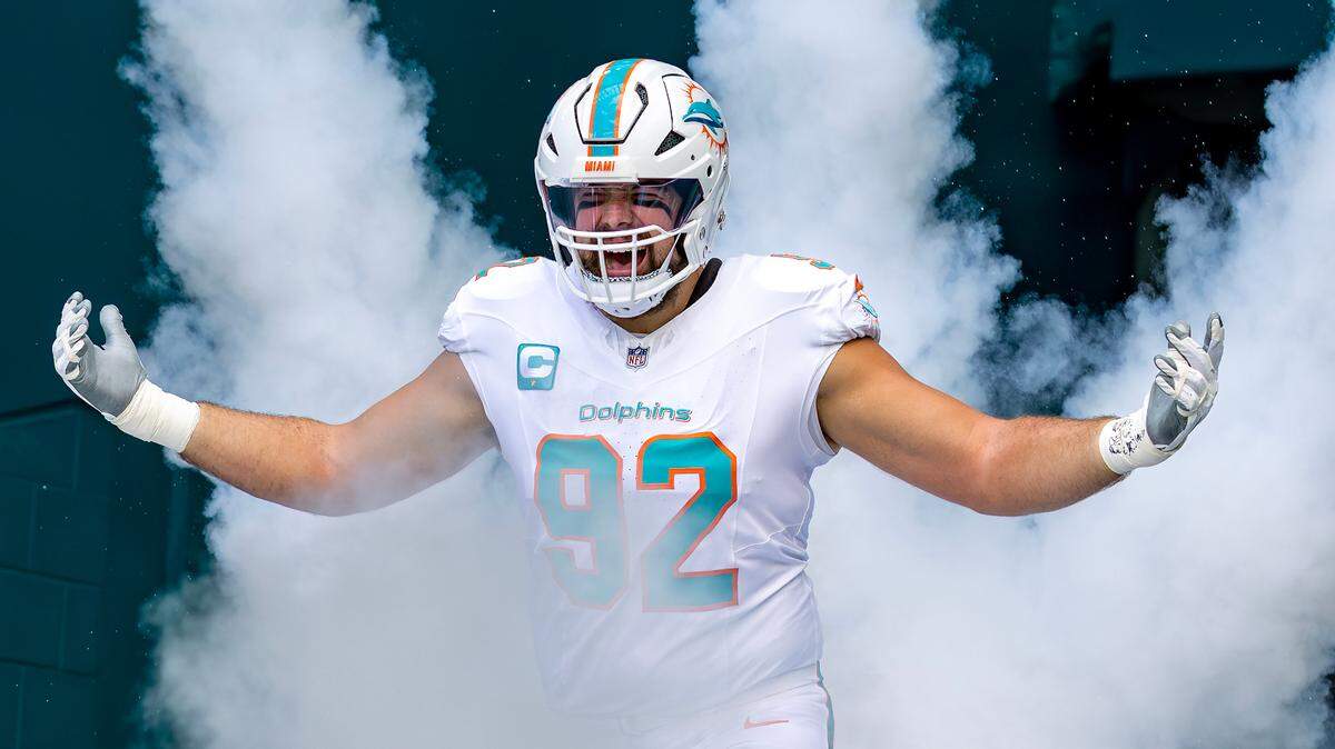 Miami Dolphins defensive tackle Zach Sieler (92) takes the field during the introduction ceremony before the start of their NFL game against the New York Jets at Hard Rock Stadium on Sunday, Dec. 8, 2024, in Miami Gardens, Florida.