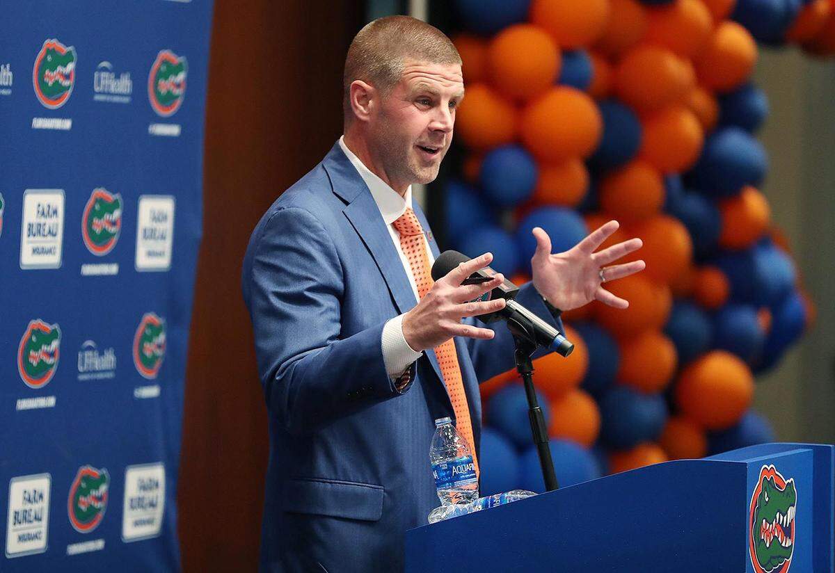 New Florida coach Billy Napier addresses reporters at Ben Hill Griffin Stadium during his first day as Gators head coach. (Stephen M. Dowell/Orlando Sentinel/TNS)