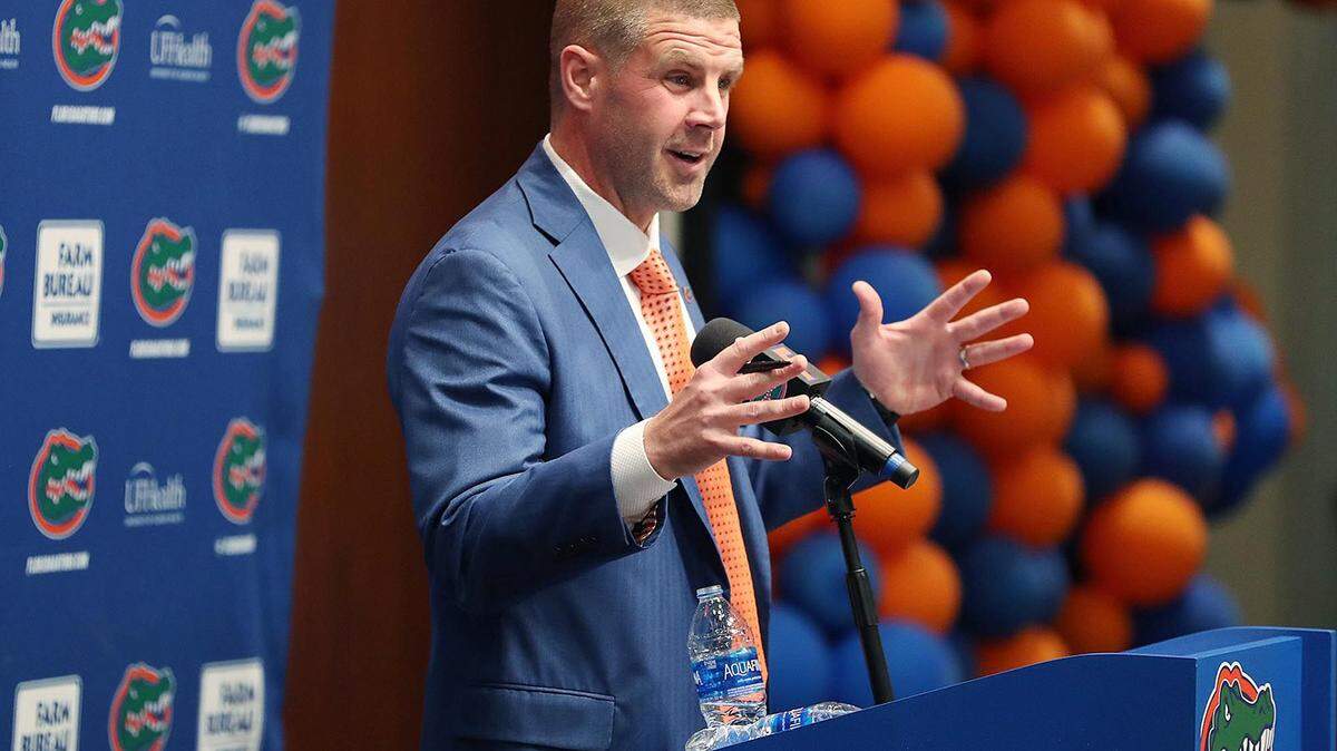 New Florida coach Billy Napier addresses reporters at Ben Hill Griffin Stadium during his first day as Gators head coach. (Stephen M. Dowell/Orlando Sentinel/TNS)
