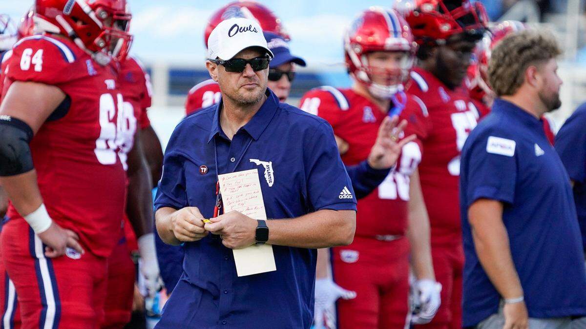 Florida Atlantic head coach Tom Herman watches his team during warm ups before a 42-20 victory over Monmouth at FAU Stadium on Saturday, September 2, 2023, in Boca Raton, FL.