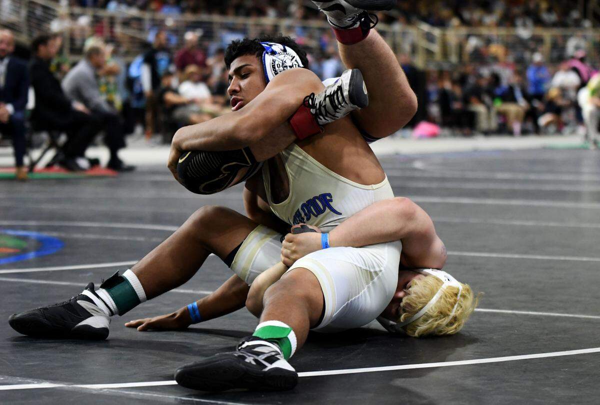 South Dade junior Jovani Solis wins the 138-pound state title, the third of his career, on Saturday at the FHSAA IBT wrestling state championships at Silver Spurs Arena in Kissimmee.