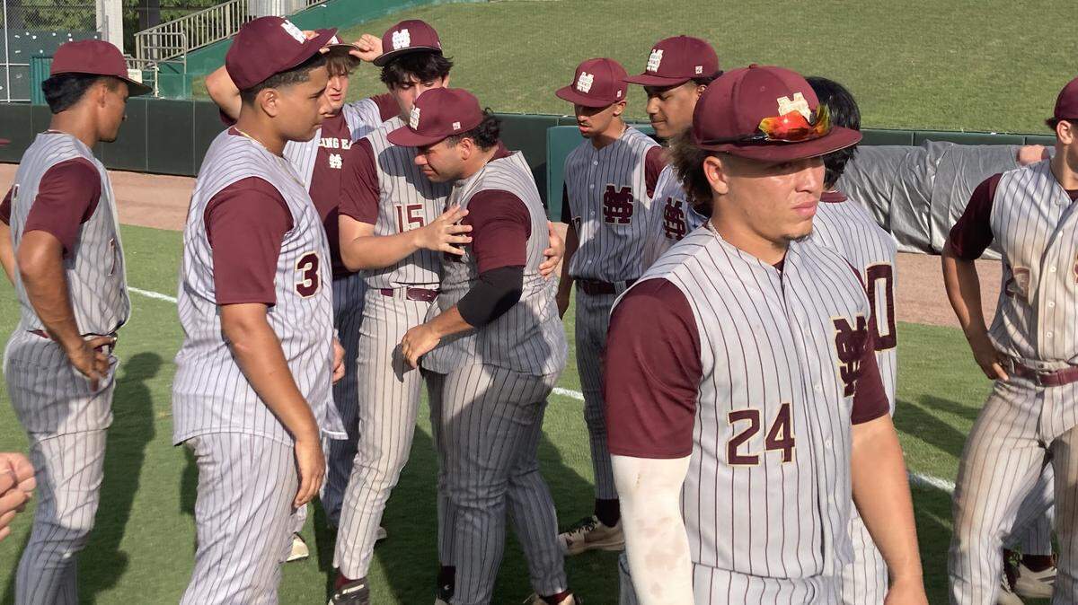 Miami Springs baseball players slowly walk off the field on Wednesday after losing 6-2 to South Walton in the Class 3A state baseball semifinal at Hammond Stadium in Fort Myers, Fla.