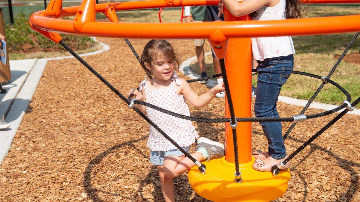 Miami-Dade Parks has just opened its Superhero Autism Playground, the first of its kind in the county. The new playground has an ADA-accessible “Whirl,” a “Spinami” motion play spinner, an “Adventure Crawl Tube,” a “Cozy Cocoon” play berm, sensory play panels, and engineered wood fiber safety surfacing.
