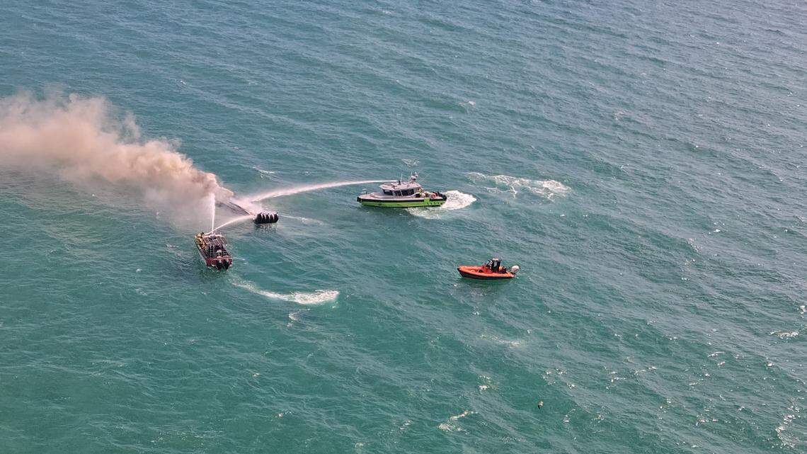 A 40-foot boat caught fire off Miami Beach near Collins Avenue; fireboats and a helicopter extinguished the blaze and rescued all aboard with no injuries.