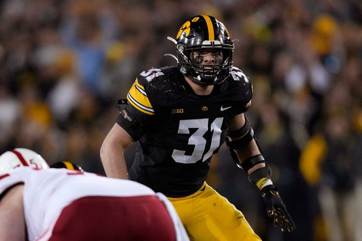 Iowa linebacker Jack Campbell gets set for a play during the second half of an NCAA college football game against Nebraska, Friday, Nov. 25, 2022, in Iowa City, Iowa. (AP Photo/Charlie Neibergall)