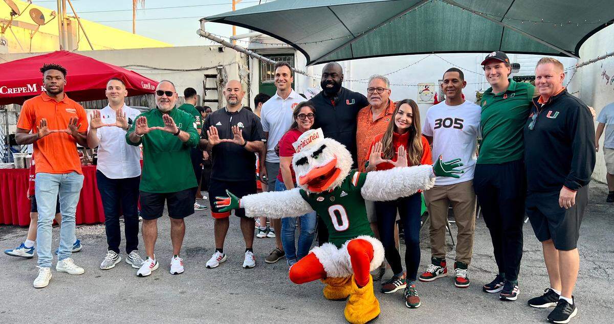 Left to right, at the 22nd annual allCanes Annual Shopping Spree for Kids, on Monday, Dec. 13, 2022: Ahmmon Richards, Angel Camacho, Jerry Campos, Jorge Baez, Alex Pou, Berta Mirabal, Edwin Pata, Harry Rothwell, Jessica Cristobal, Jon Jay, James Mulcahy and Gino DiMare.