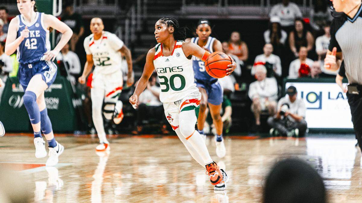 University of Miami guard Shayeann Day-Wilson, who transferred from Duke last summer, scored a game-high 17 points against her former team as the Hurricanes beat the Blue Devils 64-58