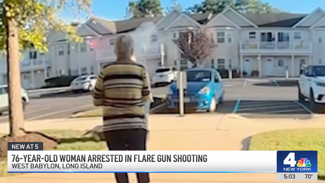 A Long Island, New York, woman accused of shooting her neighbor in the face with a flare gun has been arrested, authorities said.