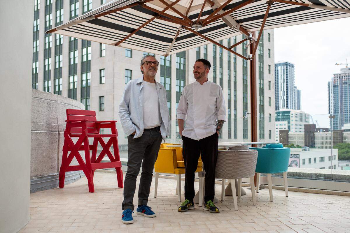 Italian chef Massimo Bottura and chef de cuisine Bernardo Paladini at the rooftop restaurant Torno Subito in downtown Miami.