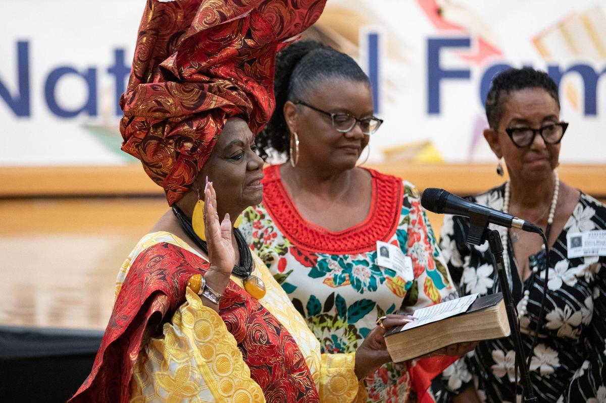 Dorothy Bendross-Mindingall is sworn in at the Miami-Dade County School Board Administration Building in Miami, Florida, on Tuesday, Nov. 22, 2022. She is the longest-serving member on the board and was reelected in August.